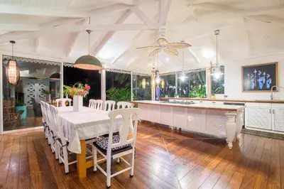 a dining room with a table and chairs at Dream On Costa Rica in Santa Cruz