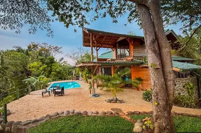 a house with a pool in front of it at Sundancefamily Paradise Villa in Sámara
