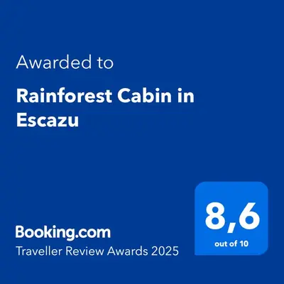 a screenshot of a cell phone with the text awarded to rainforest calemia in at Rainforest Cabin in Escazu in Escazu