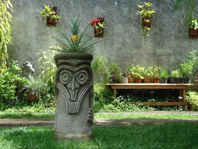 an owl planter with a plant in it in a garden at Quinta Don Fernando in La Garita