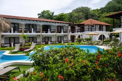 a view of the resort from the garden at Fuego del Sol Beachfront Hotel in Jacó