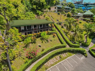 an aerial view of a resort with a garden at Tabulia Tree Hotel and Villas in Manuel Antonio