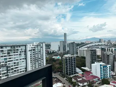 a view of a city with tall buildings at CityScape Properties 20th floor Studio 24-7 Concierge Amenities in San José