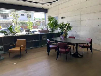 a dining room with a table and chairs at CityScape Properties 20th floor Studio 24-7 Concierge Amenities in San José