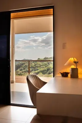 a dining room with a table and a large mirror at Finca Aquarius in Monteverde Costa Rica