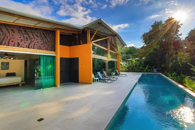 an image of a house with a swimming pool at Brand New Villa Bambú with large pool near MA in Quepos