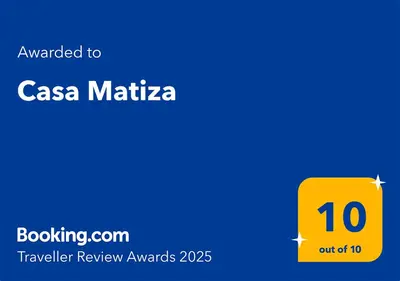 a yellow box with the textouched to csa mattica at Casa Matiza, 7 min SJO airport, free parking, AC in Santiago Este