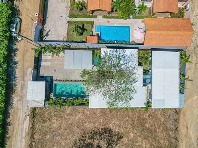 an overhead view of a house with a swimming pool at Casa Encanto Potrero, Flamingo in Liberia