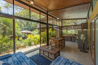 a large room with a kitchen and a dining room at Casa Cabo Blanco Mal Pais in Carmen