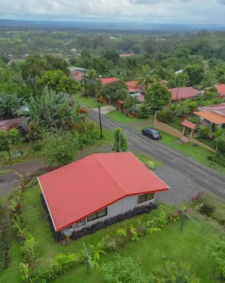 an aerial view of a house with a red roof at Casa Paraíso - La Fortuna in Fortuna