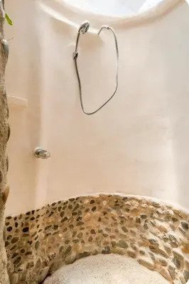a bathroom with a mirror on the wall at Casa BAMBÚ, enjoy nature in San Juan de Mata