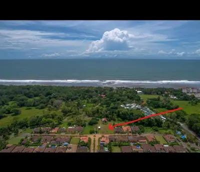 an aerial view of a city with a red arrow at Villa Alegría de vivir by Vacation Pura Vida in Bejuco