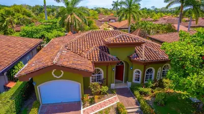 an aerial view of a house with a garage at Villa San Miguel by Vacation Pura Vida in Bejuco