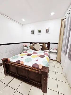 a bedroom with a bed in a room at Apartamento SamSay II in Cartago