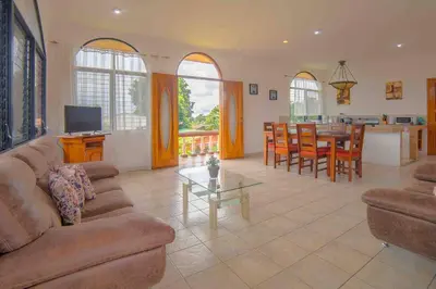 a living room with a couch and a table at FORTUNA FLAT#2, Luxury & Top View in Fortuna