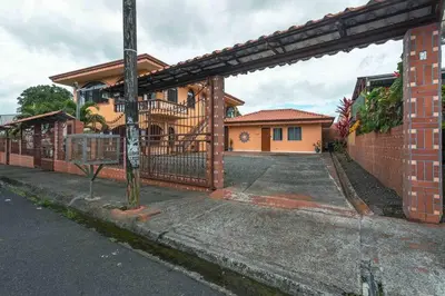 a brick house with a fence and a street at FORTUNA FLAT #1 BEST VALUE & Cozy in Fortuna