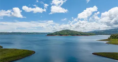 a view of a large body of water at Tinajas Arenal Lakefront Lodge in Nuevo Arenal