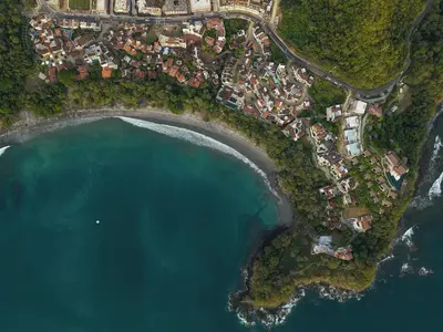an aerial view of a beach next to the water at Las Catalinas Doorway in Playa Flamingo