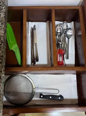 a wooden box filled with kitchen utensils at Casita Oropéndola in Monterrey