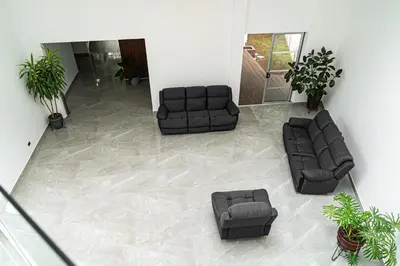 a living room with two chairs and a couch at Home 333 habitacion 336 in Escazu