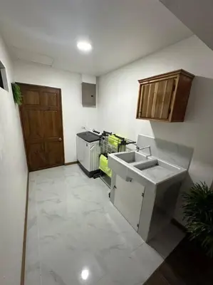 a kitchen with a sink and a stove at Bernis House with Jacuzzi in Tanque