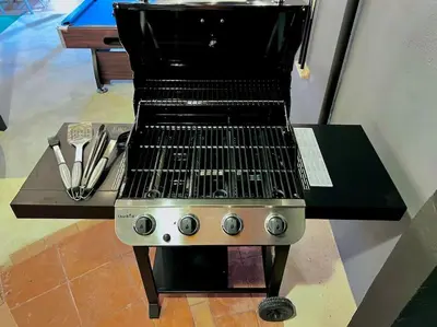 a gas grill sitting on top of a table at Casa Plata & Casa Plomo in Jacó