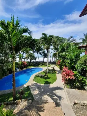 a view of the pool at the resort at Ola Bonita BeachFront Apart Hotel in Playa Hermosa