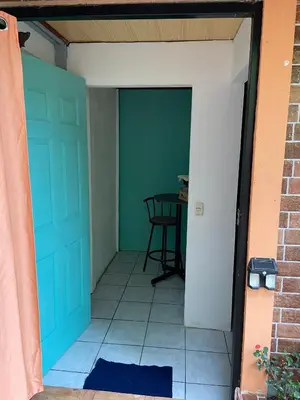a door leading to a patio with a table at viajero solitario in Buenos Aires