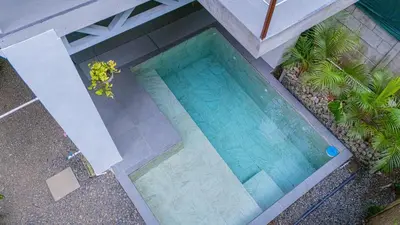 an overhead view of a swimming pool in a house at Casa Jalapa with private pool in Uvita