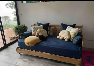 a bed with stuffed animals on top of it at Jungle paradise in Ballena
