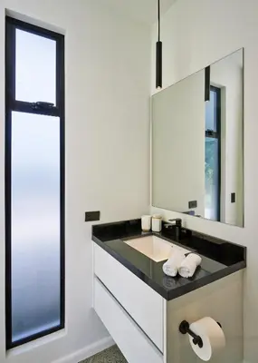 a bathroom with a sink and a mirror at Villa Alba 4ensuite rooms ocean view Malpais in Mal País