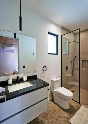 a bathroom with a toilet and a sink and a shower at Casas Alba - 1 bedroom Loft private kitchen bathroom and terrace Malpais in Mal País