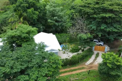 a white truck parked in front of a house at Casa Lupa in San Rafael