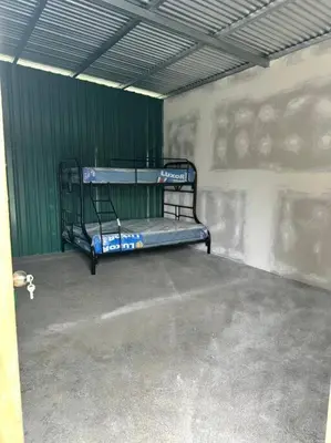 a room with a bunk bed in a building at Camping El Fosforo in El Fosforo