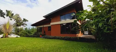 a house with a green lawn in front of it at Green leaf house in Fortuna