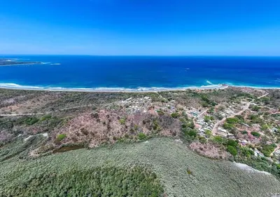 an aerial view of a beach and the ocean at Cozy Beachside Studio with Pool and Free WiFi in Playa Grande