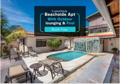 an image of a house with a swimming pool at Cozy Seaside Studio Perfect for Families in Playa Grande