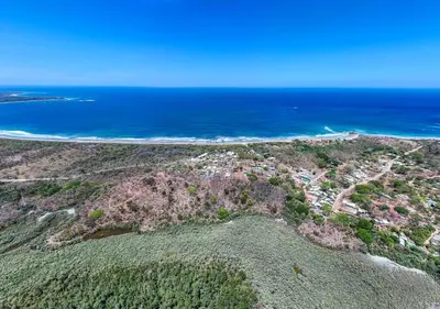 an aerial view of the beach and ocean at Charming Studio with Pool & Beach Access in Playa Grande