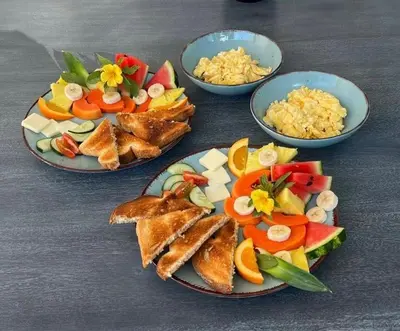 a group of plates of food on a table at Hotel Good Life in Coco