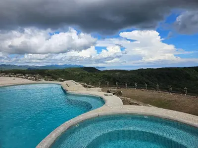 a swimming pool in the middle of the water at Casona Cocobolo el mejor lugar de Costa Rica in Guanacaste