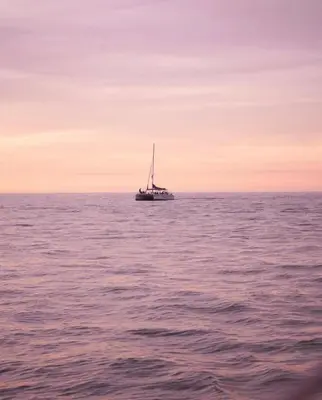 a boat sitting in the middle of the ocean at Villas Vibras in Playa Avellana