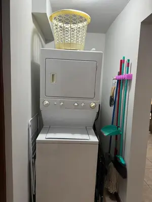 a refrigerator with a basket on top of it at Supreme Serenity 2BR2BA Ocotal Coastal Retreat in Coco