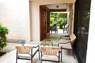 a group of chairs and tables on a patio at Supreme Serenity 2BR2BA Ocotal Coastal Retreat in Coco