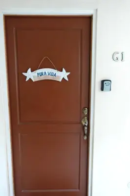 a door with a sign that reads im a video at Supreme Serenity 2BR2BA Ocotal Coastal Retreat in Coco