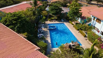an overhead view of a swimming pool in a house at Coastal Comfort Spacious Second-Floor Getaway in Coco
