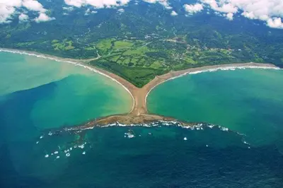 an aerial view of an island in the ocean at Apartment with large terrace and garden view in Uvita