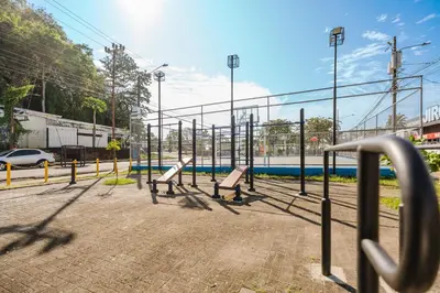 an empty playground with benches in a park at Apartamento Frigia 2 in Quepos