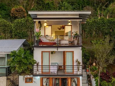 an aerial view of a house with a balcony at Yaloco House Monteverde in Monteverde Costa Rica