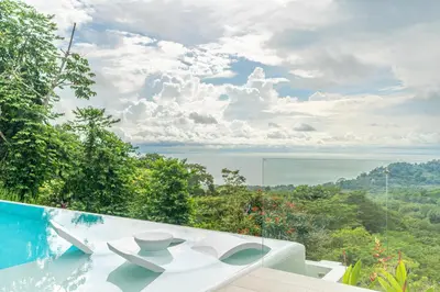 a house with a view of the ocean at Casa Frenchie & Villas Vista del Mar - by Pura Villas in Dominicalito