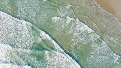 an overhead view of the ocean with waves at Casa Manzanillo Surf in Manzanillo